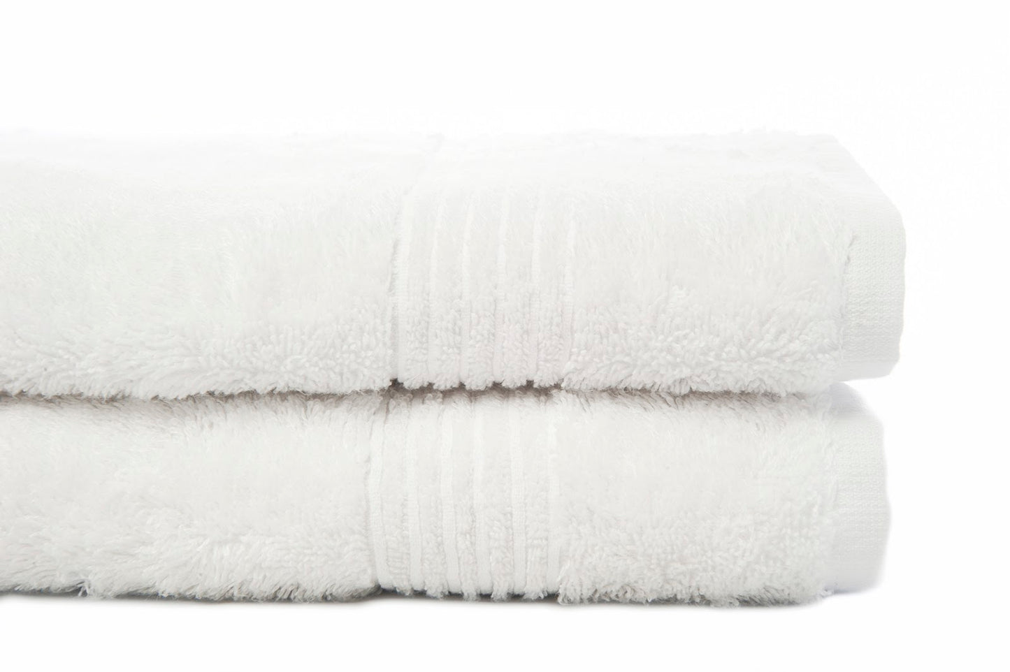 Two white towels stacked on top of one another.